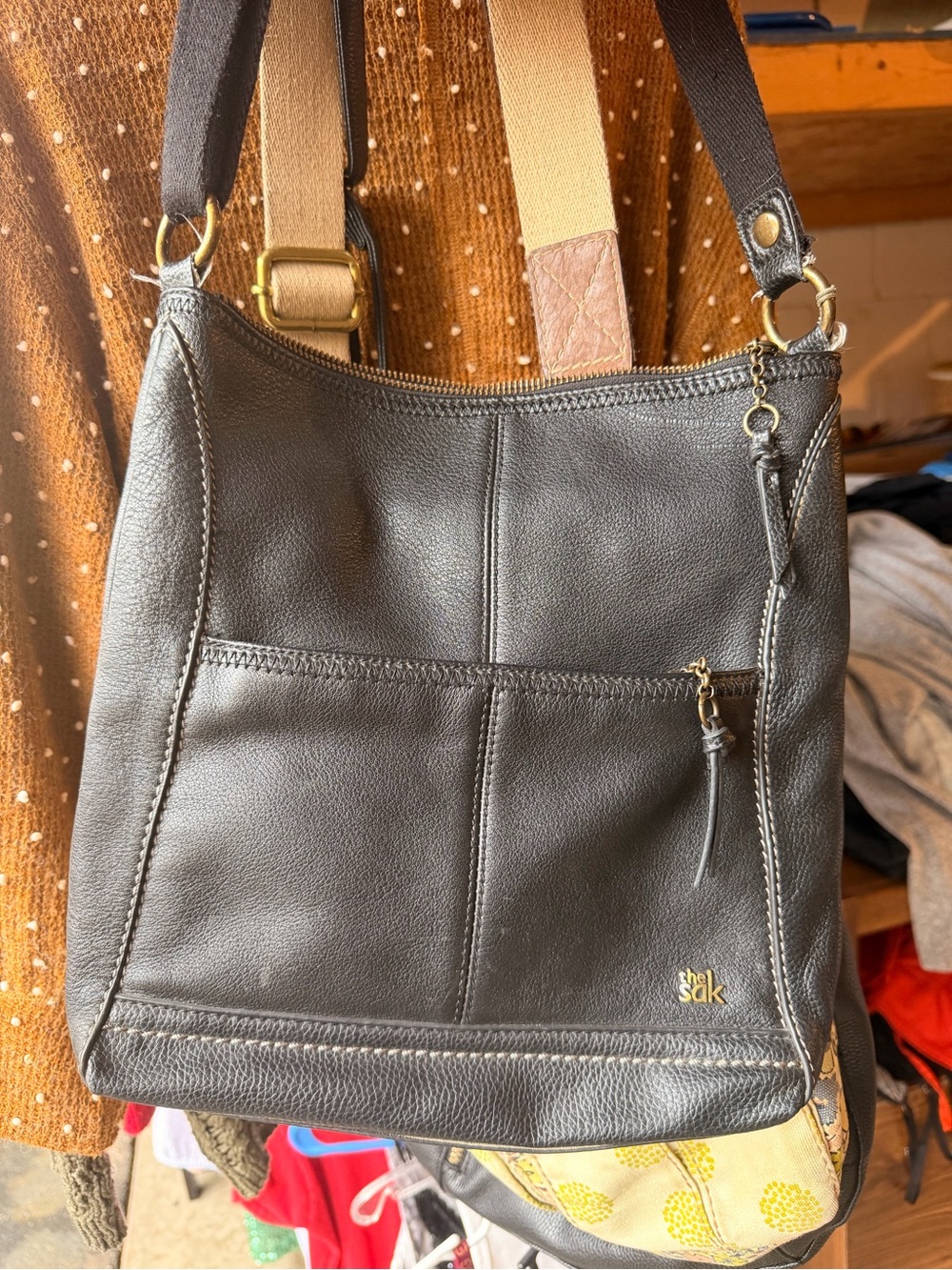 The Sak Black Leather Shoulder Bag with Gold Hardware